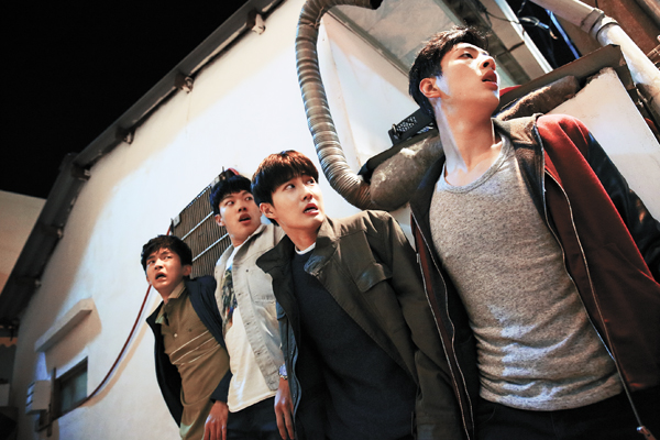 In the upcoming film “One Way Trip,” actors, from left, Kim Hee-chan, Ryu Jun-yeol, Kim Joon-myeon and Kim Ji-soo play four reckless yet innocent boys who take off on their first trip together, only to be swept up in an unexpected incident that threatens to tear their friendship apart. The film opens on Thursday.