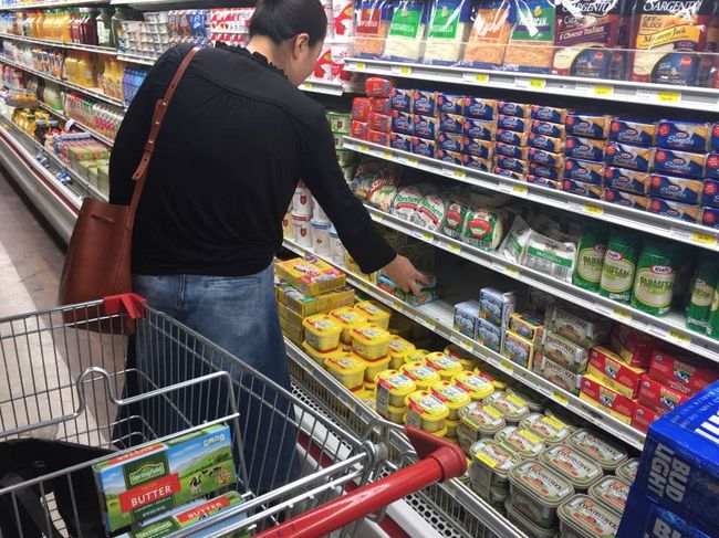 The high-fat diet, which has become popular in South Korea, is now one of the trending topics in Southern California. A woman is purchasing butter at a Koreatown market. 