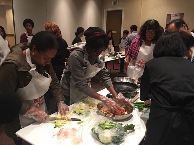 Students are making Kimchi at the Korean Cooking Class for Non-Koreans on Oct. 30.