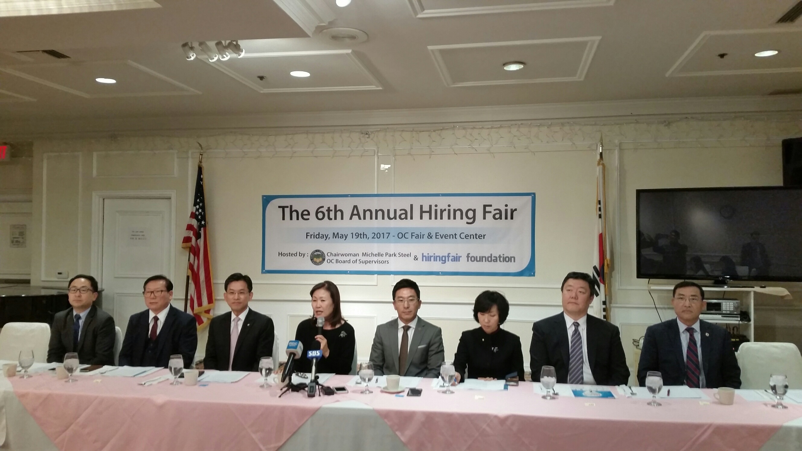 Nonprofit group Hiring Fair Foundation is announcing the plan to host a job fair in Orange County in May. Orange County Supervisor Commission’s Michelle Steel (fourth from left) is giving an introductory speech at the press conference.