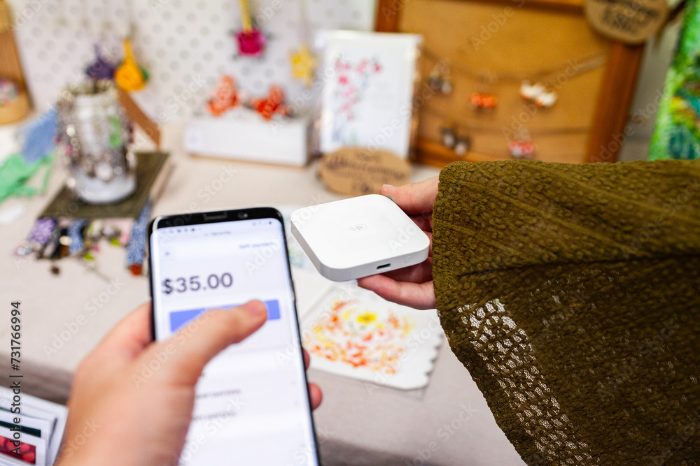 Paying for items at small side hustle business with square payment terminal