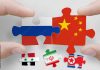 China seen as America’s top enemy, North Korea holds most unfavorable Puzzle made from flags of Russia, China, Syria, Iran and North Korea. Russia and China relations and military collaboration