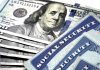Millions Could Lose $462 a Month as Social Security Nears 2033 Collapse Social Security Cards in a Row Pile for Retirement