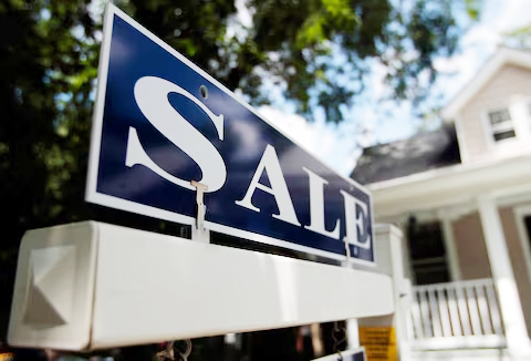 For sale sign in front of a house reflecting Koreatown real estate prices rise