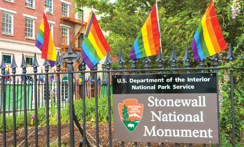 rainbow flag at Stonewall National Monument in Greenwich Village related to religious belief vs workplace policy