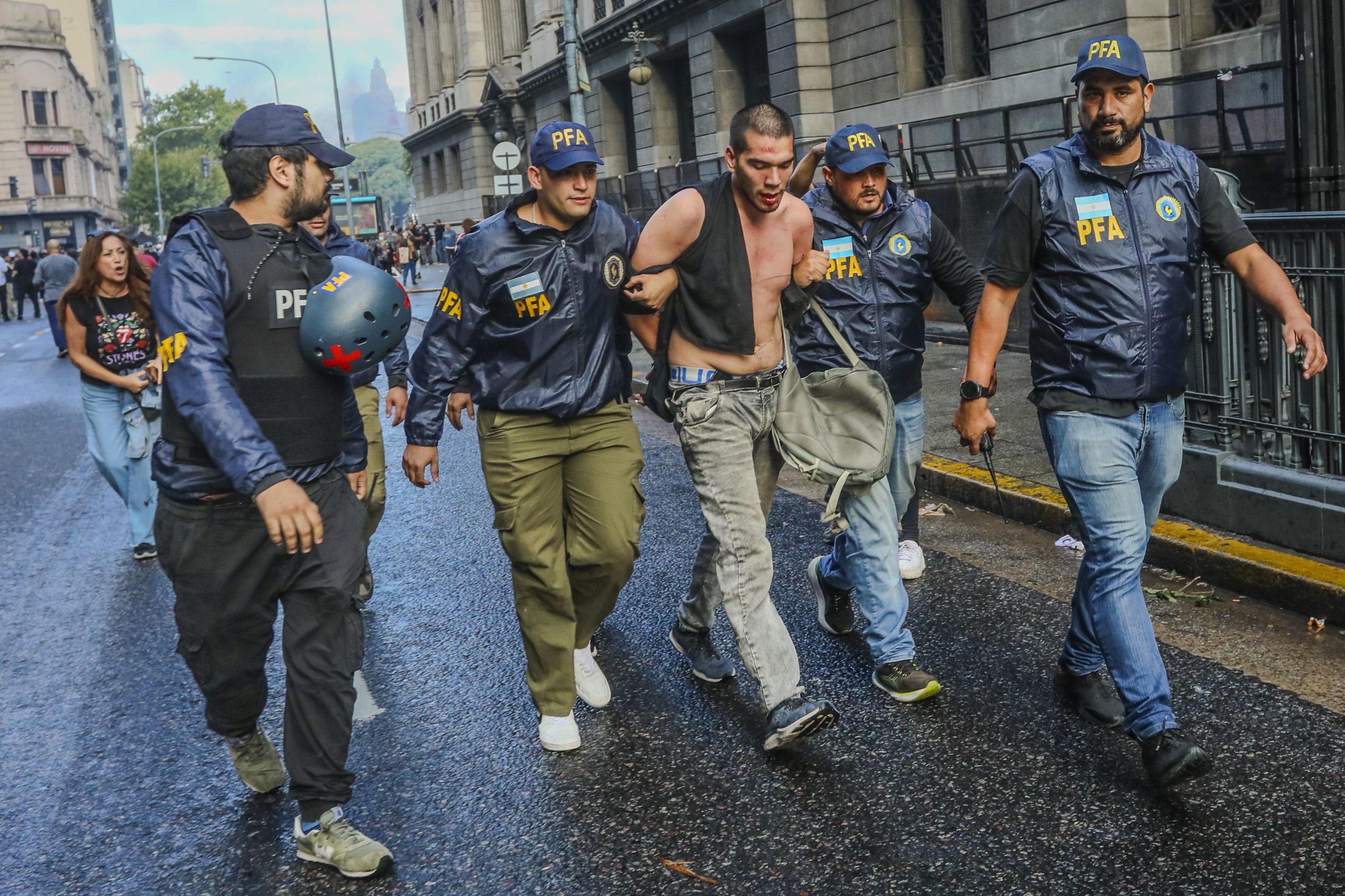 Police detain protester during Peronist nostalgia Argentina rally