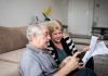 California Retirees Face $330,000 Shortfall – Fifth Largest in the Nation Senior couple checking medical bills on smartphone amid Medicare fraud settlement news