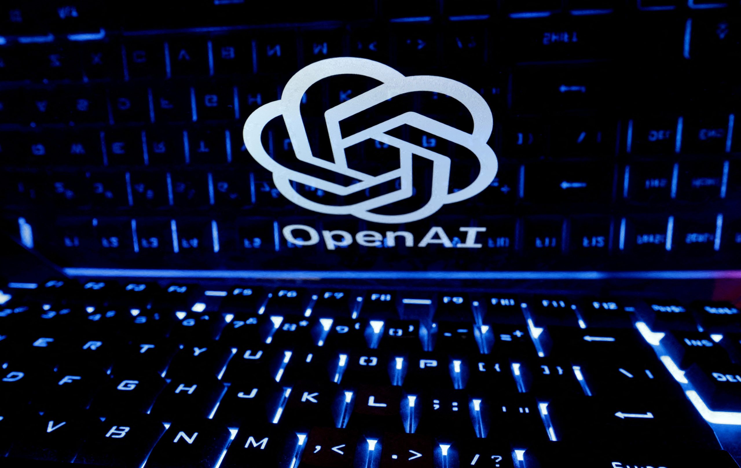 Keyboard in front of OpenAI logo illustrating AI shutdown refusal