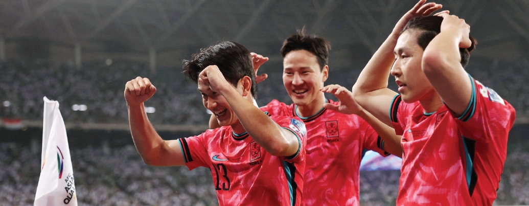 Jin-kyu Kim celebrates after scoring South Korea's first goal against Iraq during 2026 World Cup qualifiers