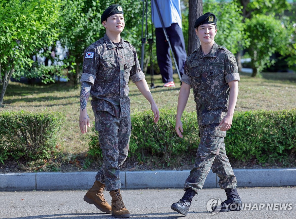 BTS Jungkook and Jimin smile at fans after completing military service in Yeoncheon