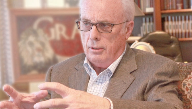 John MacArthur speaking with hand gestures during an interview about the state of the modern church