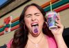 7-Eleven Slurpee Day 2025 Returns with Free Drinks, Tattoos, $5K Prizes 7-Eleven Slurpee Day 2025 poster with woman holding Slurpee and showing tongue tattoo
