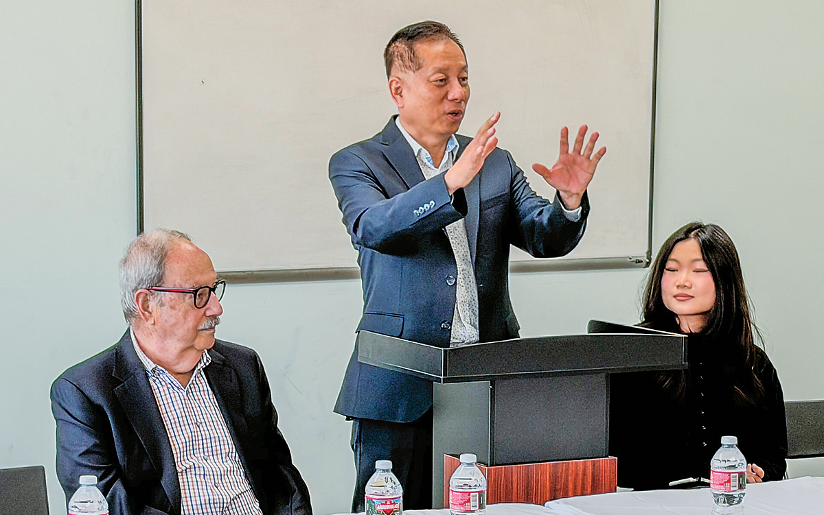NYCC board member Scott Seo speaks about the Koreatown free tutoring program during a briefing at the organization’s office.