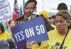 With Texas Map Struck Down, California’s Prop 50 Loses Its Justification Protesters at a Los Angeles immigration rally hold signs supporting Prop 50 redistricting reform on October 4.
