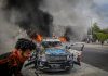 BLM Preached Justice — Now Faces a $90M Donation Fraud Probe LAPD patrol car burns with graffiti during the May 30, 2020 BLM protest in Los Angeles, part of the BLM donation fraud investigation coverage.