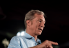 Democrat Billionaire Tom Steyer Runs for Governor After Years in Coal and ICE Prison Deals Tom Steyer speaking in a campaign-style setting