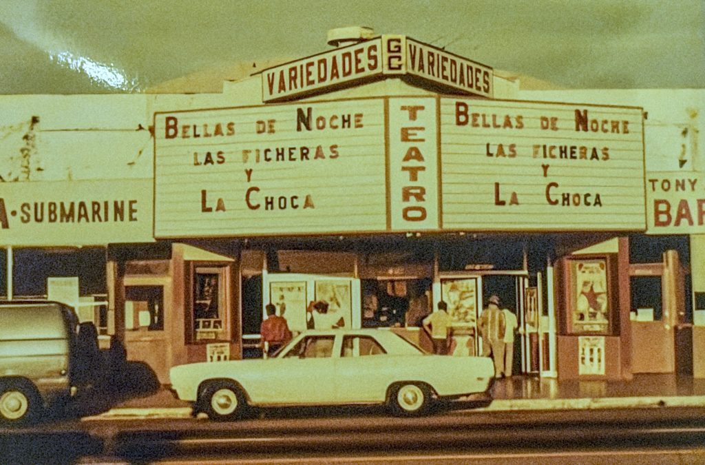 Spanish-language movie titles on Gardena Cinema marquee in historic photo