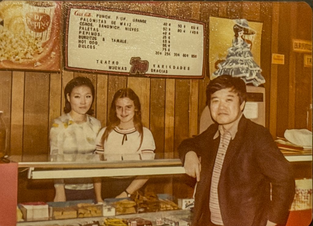 John Kim and Nancy Kim standing at Gardena Cinema concession stand