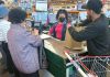 Paper Bags Replace Plastic at LA Korean Markets, Leaving Shoppers Frustrated Customer packs groceries into a paid paper bag at a Hannam Chain checkout in LA after the plastic bag ban took effect