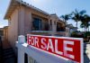 US Home Purchase Cancellations Hit Record High A residential home for sale sign is shown in California
