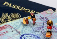 Why US Visa Scrutiny Is Rising—and Who It’s Hitting Hardest 2 men in yellow and black suit action figures