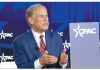 “Socialism Kills”: Greg Abbott Defends Texas Policies on Crime and Immigration at CPAC Texas Governor Greg Abbott speaking at a podium with CPAC branding in the background during a speech on conservative policies and crime.
